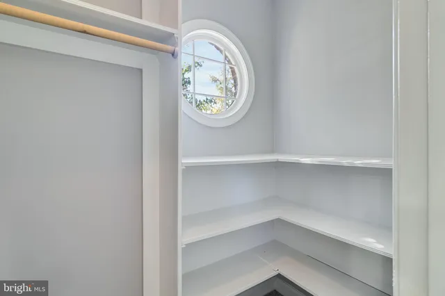 a view of space with racks on the wall