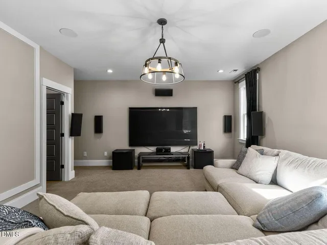 a view of a backyard with sitting area