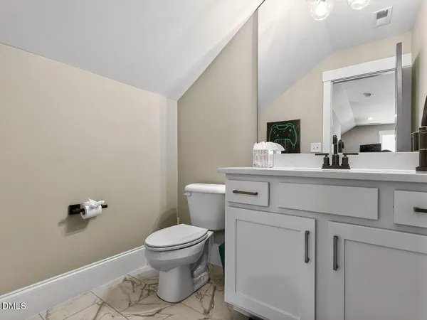 a view of a backyard with sitting area