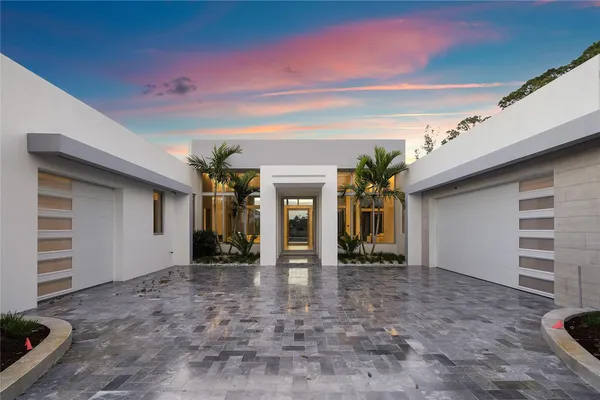 a living room with furniture a dining table and chairs with outer view