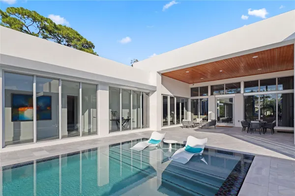 a front view of house with outdoor seating