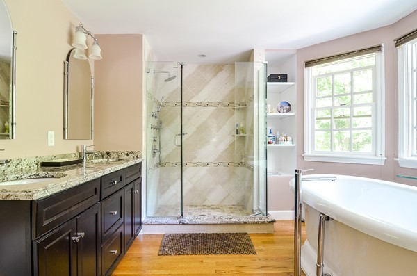71 Yarmouth Road Wellesley, MA 02481 - Photo 19 of 21 a bathroom with a granite countertop sink and a mirror