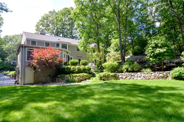 71 Yarmouth Road Wellesley, MA 02481 - Photo 2 of 21 a view of an house with backyard space and garden