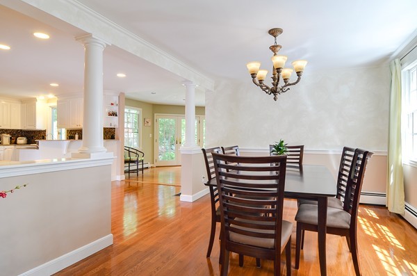 71 Yarmouth Road Wellesley, MA 02481 - Photo 8 of 21 a view of a dining room with furniture and chandelier
