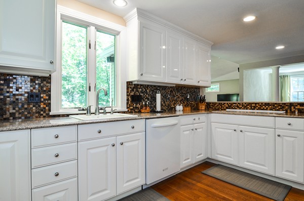71 Yarmouth Road Wellesley, MA 02481 - Photo 9 of 21 a kitchen with white cabinets and sink