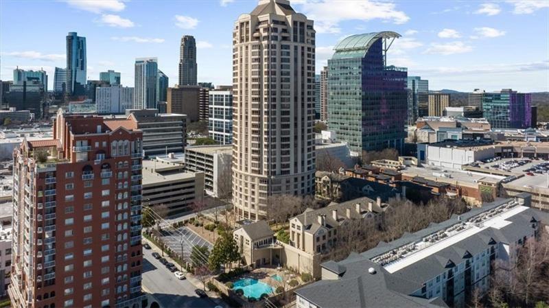 3475 Oak Valley Road Northeast, Unit 410 Atlanta, GA 30326 - Photo 2 of 36 a city view with tall buildings