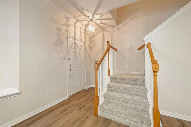 a view of entryway with wooden floor