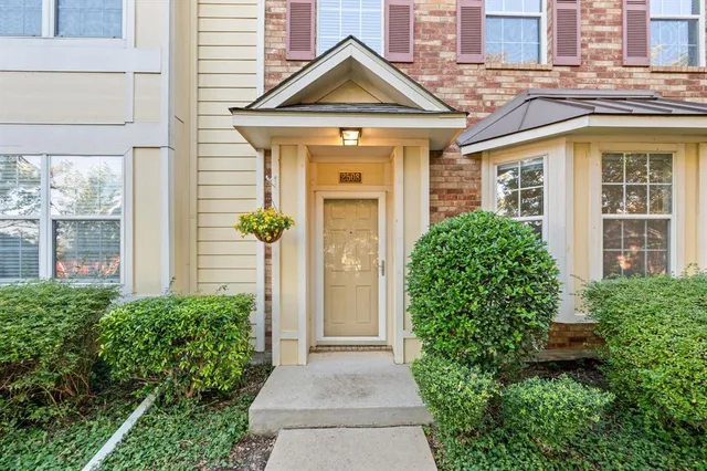 a front view of a house with yard