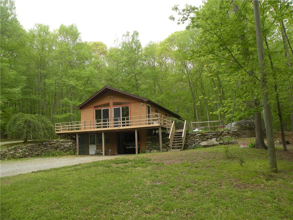 86 Hanover Versailles Road Sprague, CT 06330 - Photo 1 of 1 a house view with a outdoor space