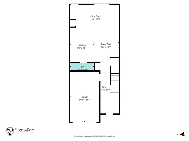 a picture of a bench in front of gate