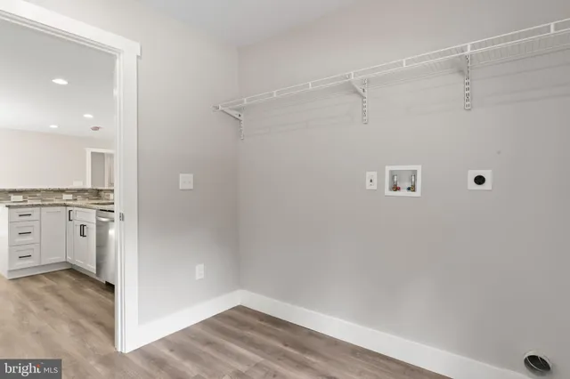 a view of a room with racks on the wall