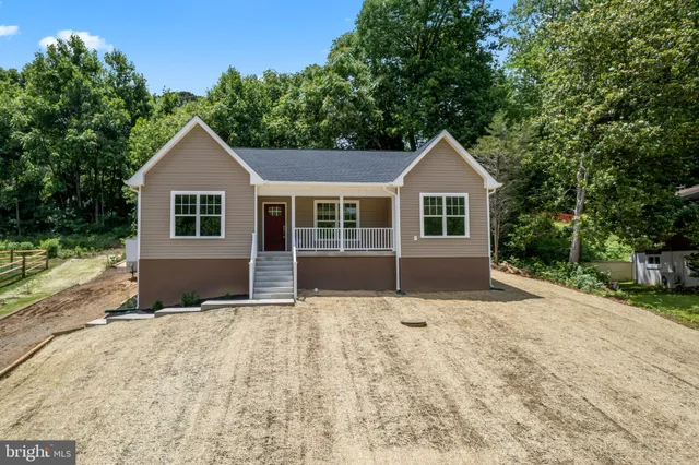 a house view with a garden space