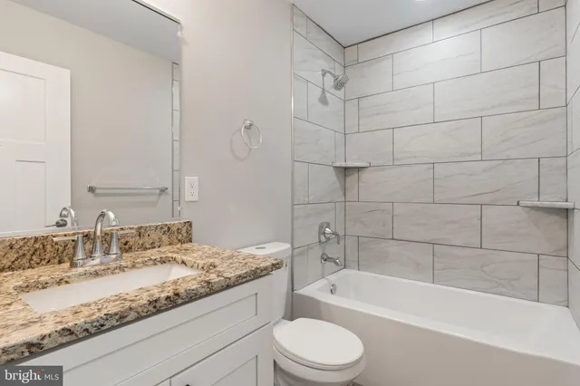 a aerial view of a house with a yard