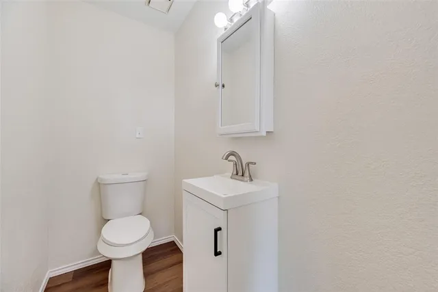 a view of a yard with lots of trees