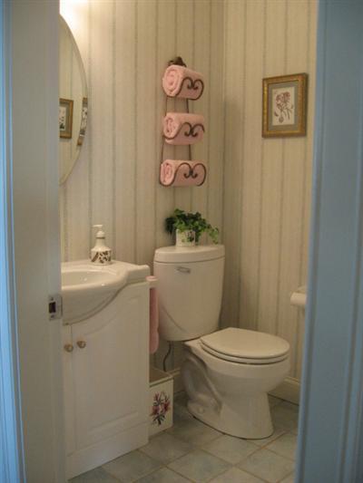 43 Ruggles Road Orleans, MA 02653 - Photo 11 of 22 a bathroom with a toilet sink vanity and mirror