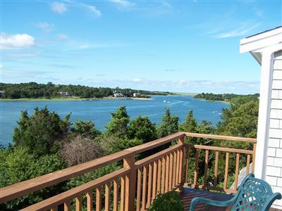 43 Ruggles Road Orleans, MA 02653 - Photo 17 of 22 a view of city and mountain from a balcony