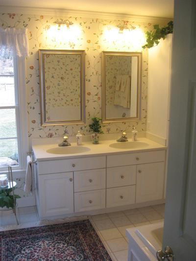 43 Ruggles Road Orleans, MA 02653 - Photo 10 of 22 a bathroom with double vanity sink and mirror