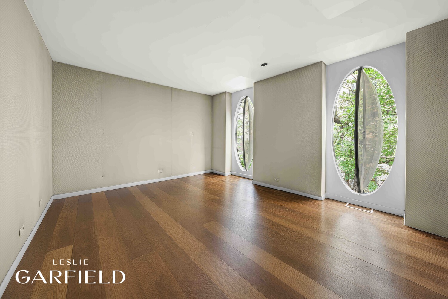 251 East 71st Street Manhattan, NY 10021 - Photo 4 of 10 a view of an empty room with window