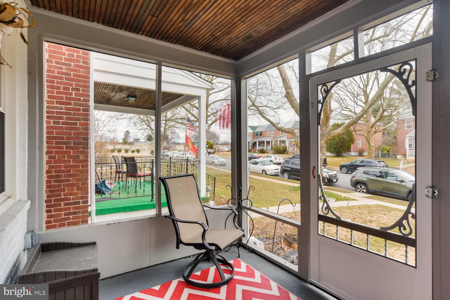 8360 Hillendale Road Baltimore, MD 21234 - Photo 4 of 30 a view of a porch with furniture and a gate