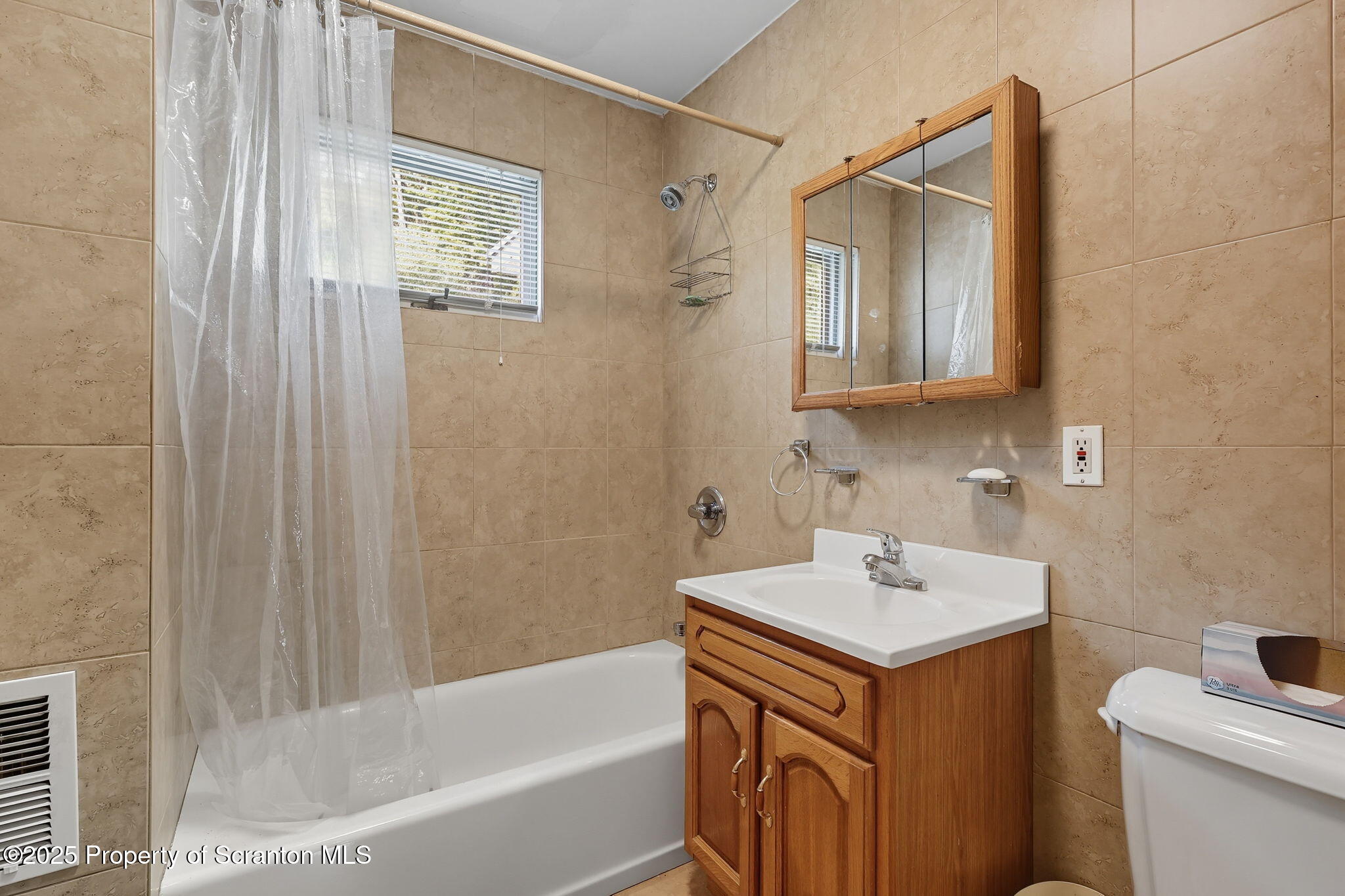 505 Creek Road Kingsley, PA 18826 - Photo 20 of 61 a bathroom with a sink a toilet and a bathtub