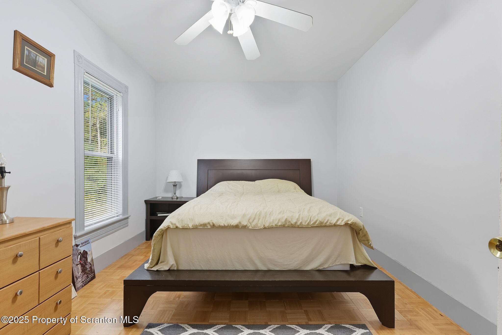 505 Creek Road Kingsley, PA 18826 - Photo 21 of 61 a bedroom with a bed and window