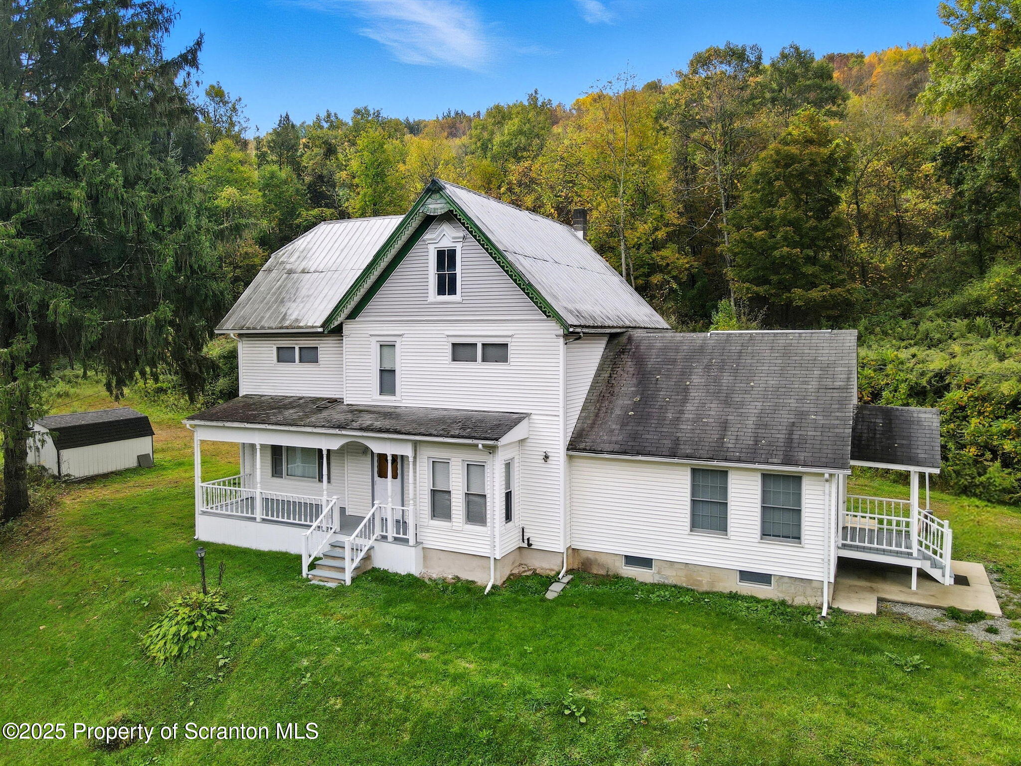 505 Creek Road Kingsley, PA 18826 - Photo 34 of 61 a aerial view of a house with a yard