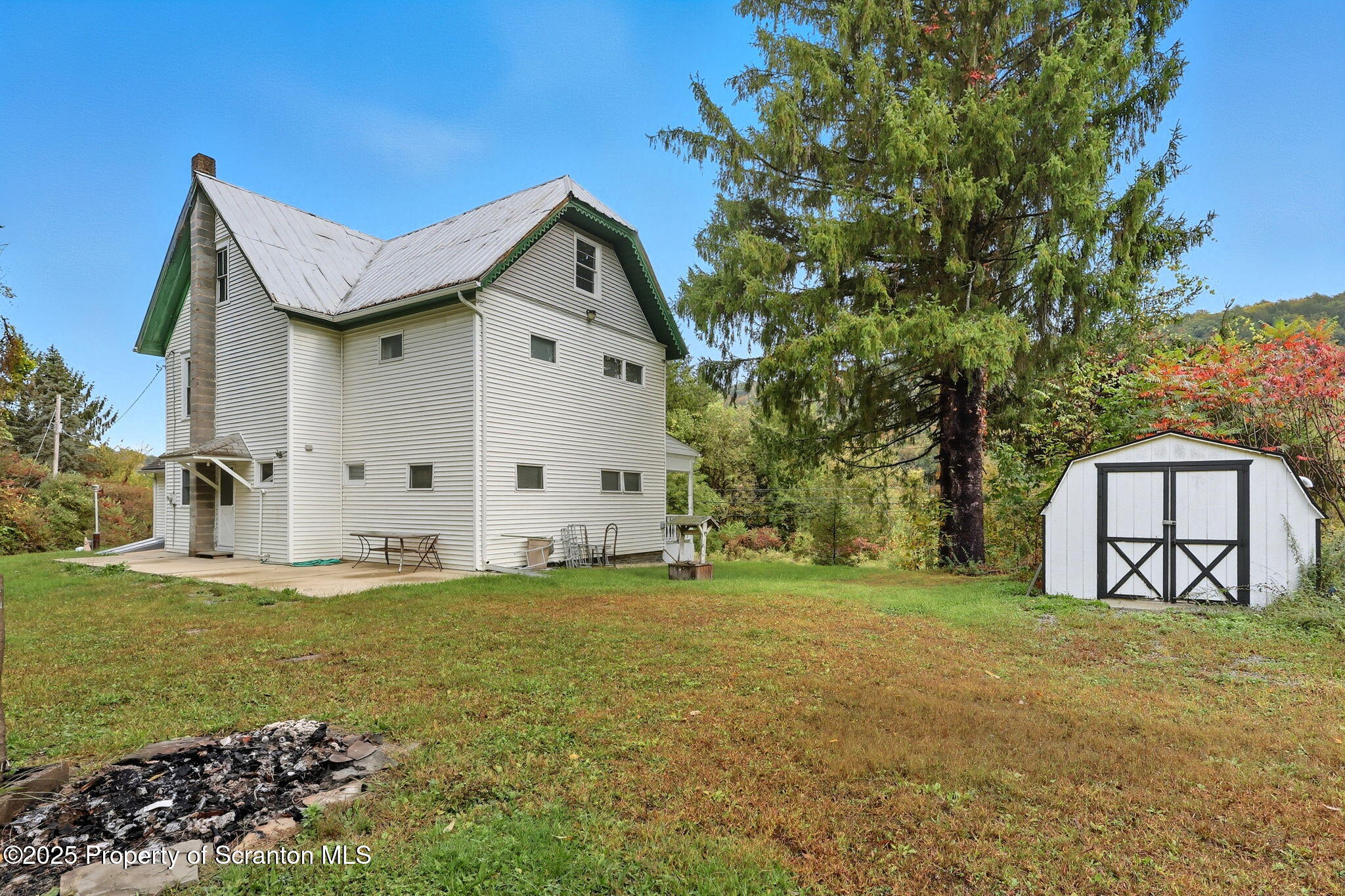 505 Creek Road Kingsley, PA 18826 - Photo 35 of 61 a front view of a house with a yard