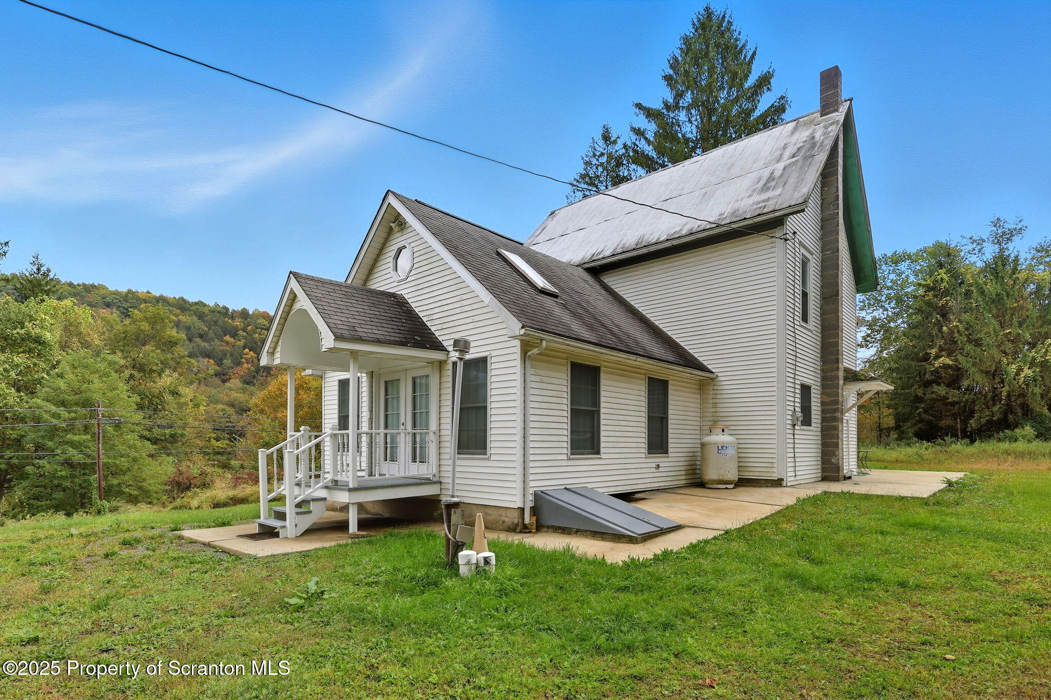 505 Creek Road Kingsley, PA 18826 - Photo 36 of 61 a front view of a house with a yard