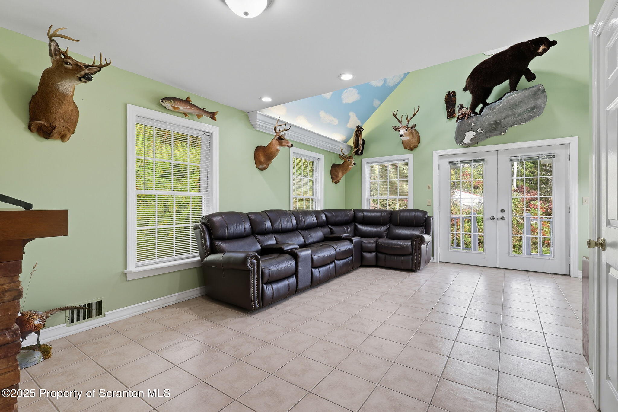 505 Creek Road Kingsley, PA 18826 - Photo 4 of 61 a living room with furniture chess board and a window