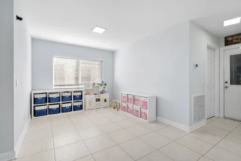 an empty room with shelves