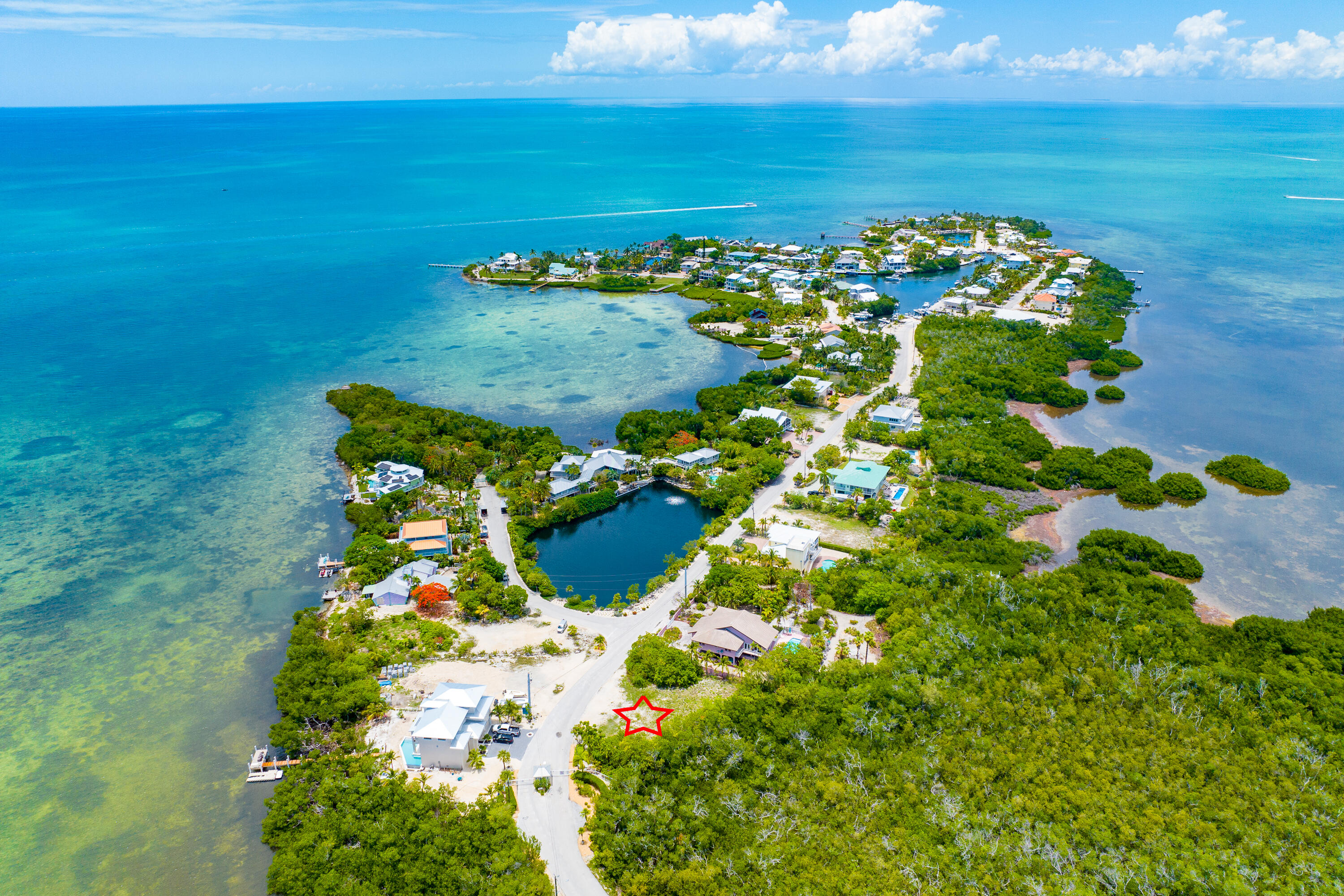 a view of a lake with a big yard