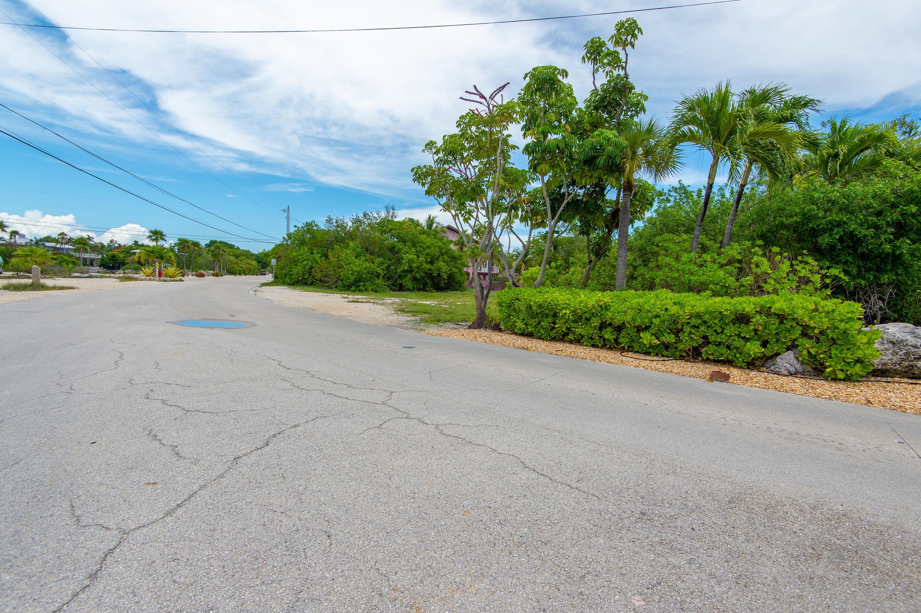 199 Stirrup Key Boulevard Marathon, FL 33050 - Photo 17 of 24 a view of a road with a building in the background