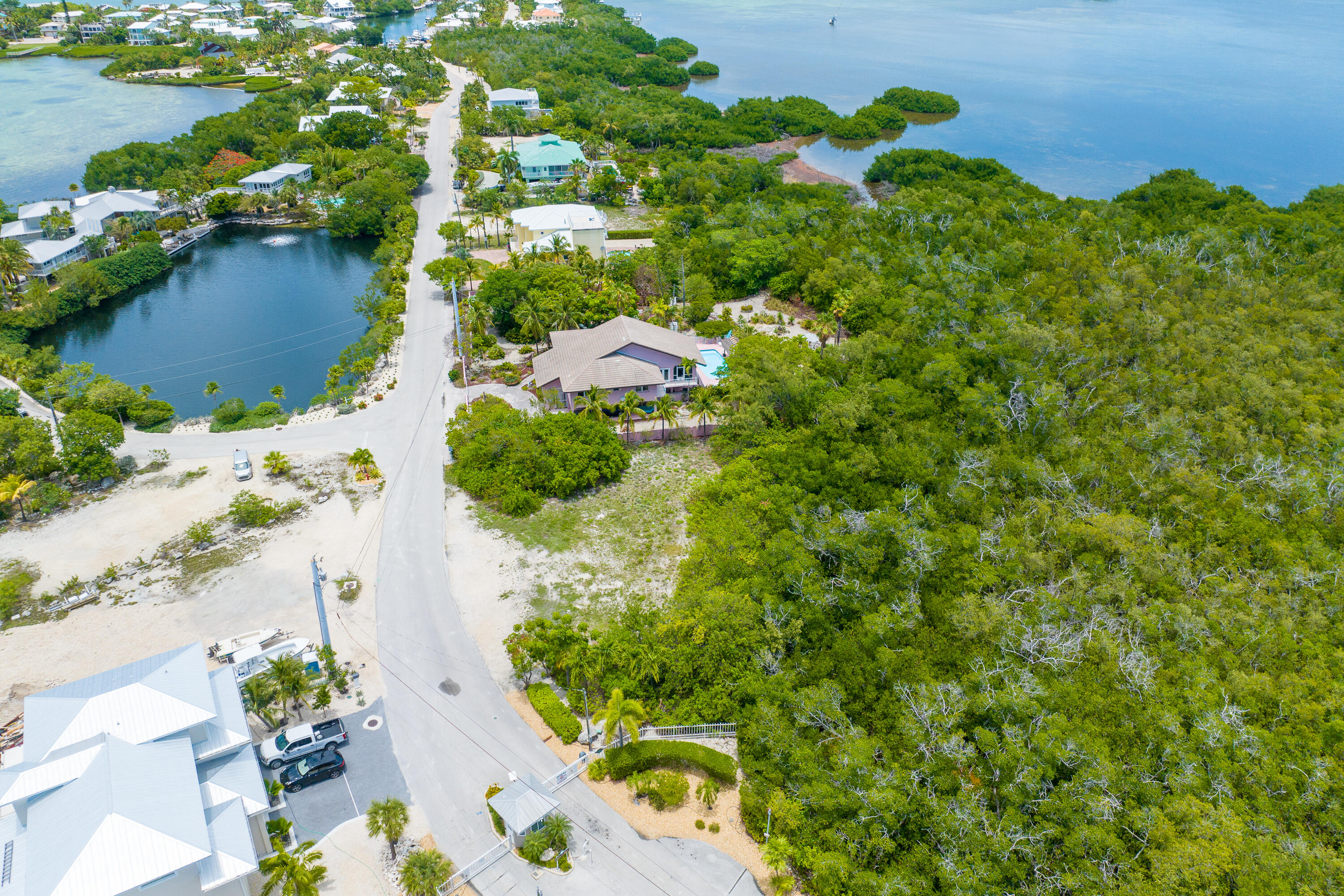 199 Stirrup Key Boulevard Marathon, FL 33050 - Photo 19 of 24 an aerial view of residential house with yard and outdoor seating