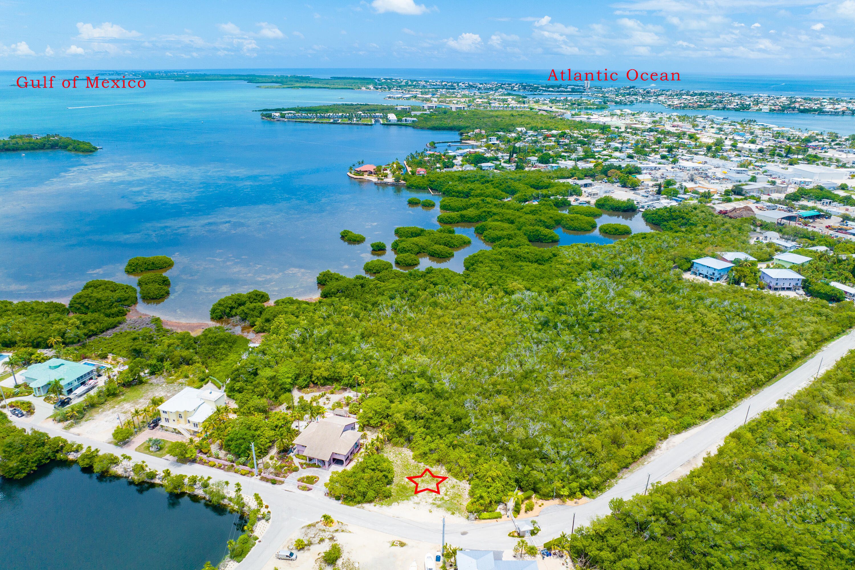 199 Stirrup Key Boulevard Marathon, FL 33050 - Photo 2 of 24 a view of a lake with a city