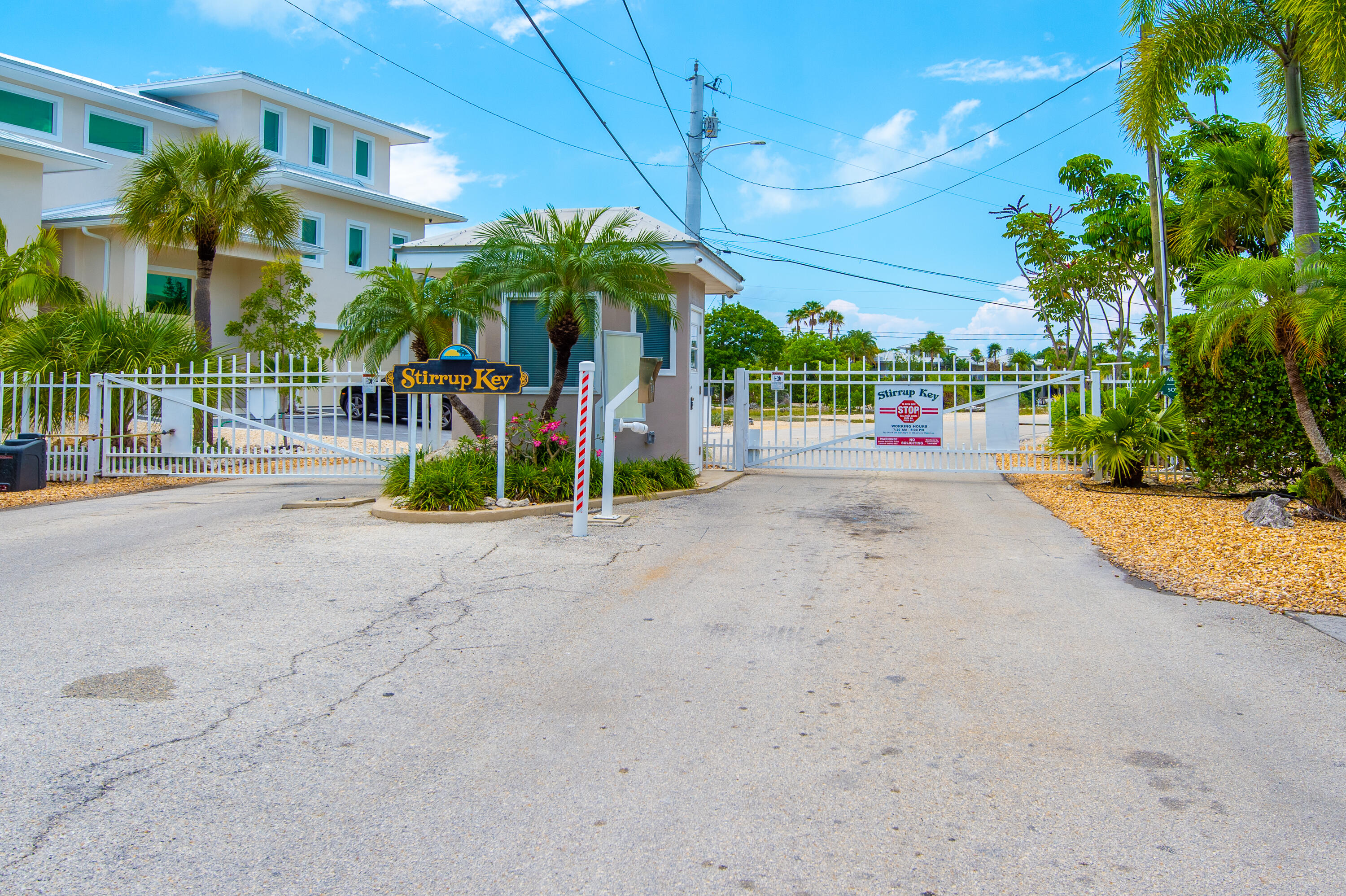 199 Stirrup Key Boulevard Marathon, FL 33050 - Photo 7 of 24 a view of a house with a yard and potted plants