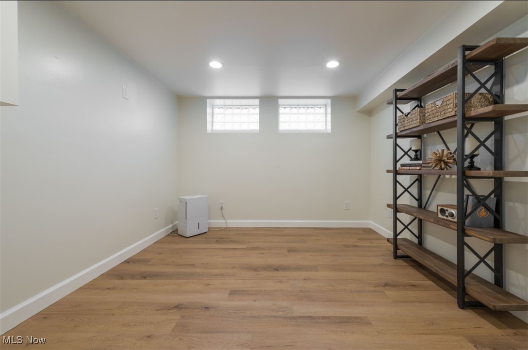 16501 Munn Road Cleveland, OH 44111 - Photo 33 of 42 Basement with recessed lighting and light wood-style flooring
