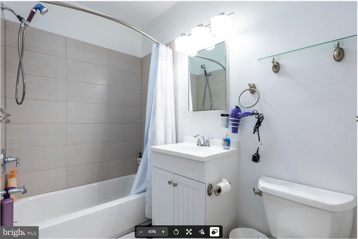 8526 Germantown Avenue, Unit 2 Philadelphia, PA 19118 - Photo 14 of 19 a bathroom with a sink toilet and shower