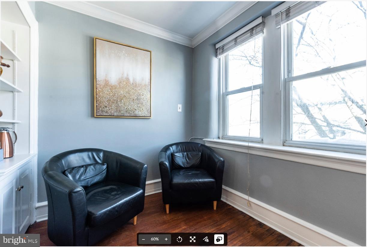 8526 Germantown Avenue, Unit 2 Philadelphia, PA 19118 - Photo 16 of 19 a living room with furniture and a window