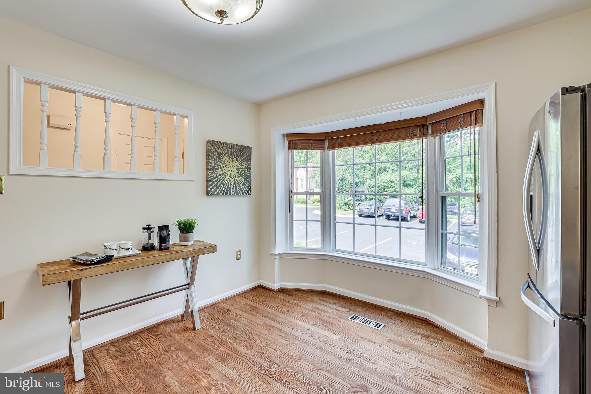 11962 Sentinel Point Court Reston, VA 20191 - Photo 12 of 62 There's space for a table by the bay window.