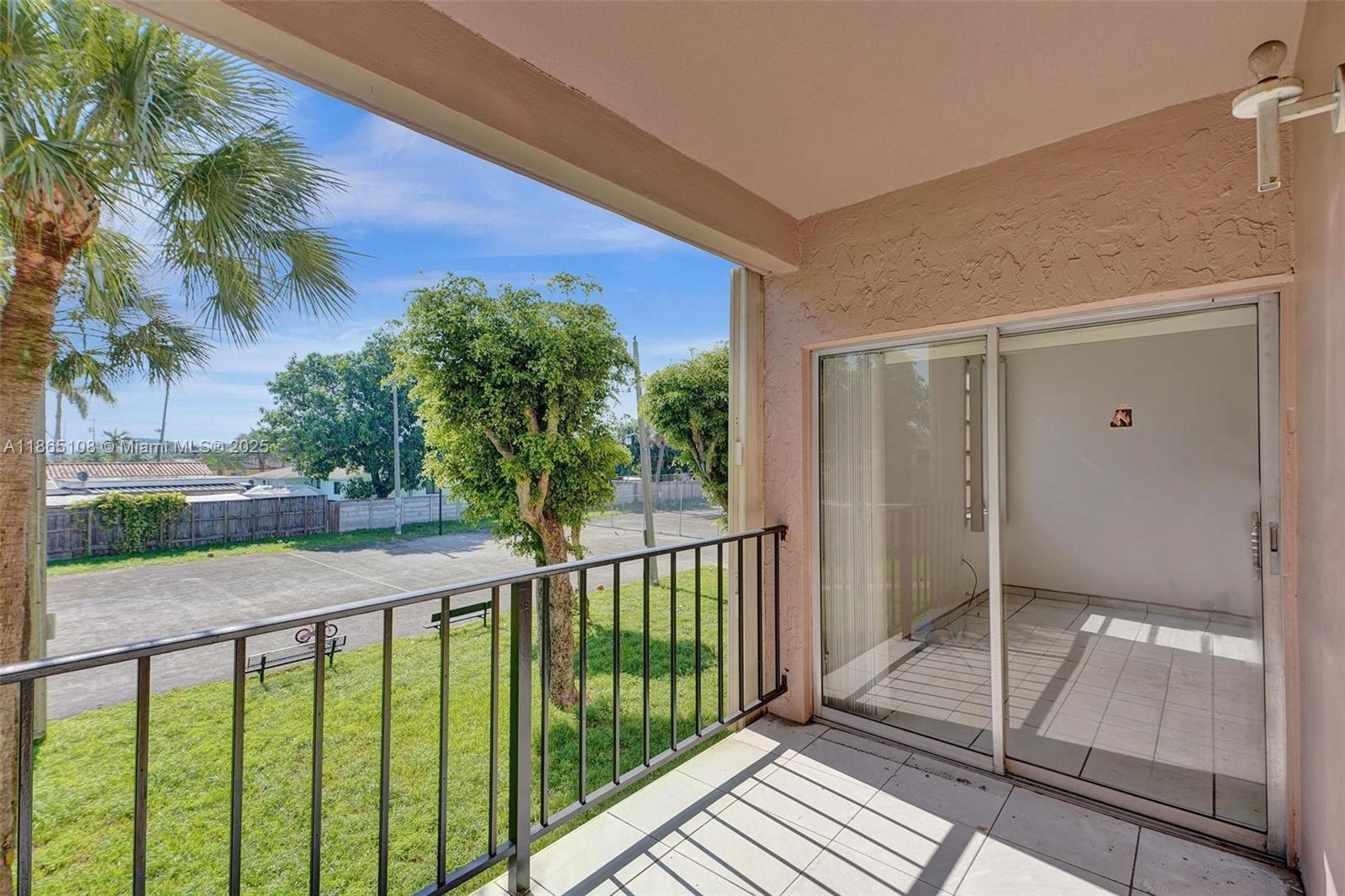 1900 West 68th Street, Unit C203 Hialeah, FL 33014 - Photo 15 of 29 a view of a balcony