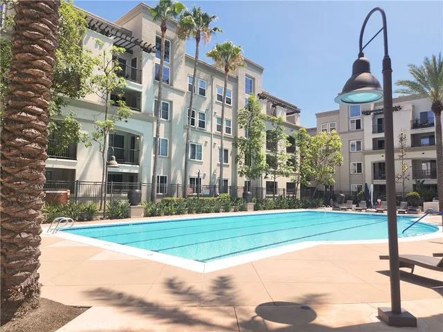 a view of pool with outdoor seating
