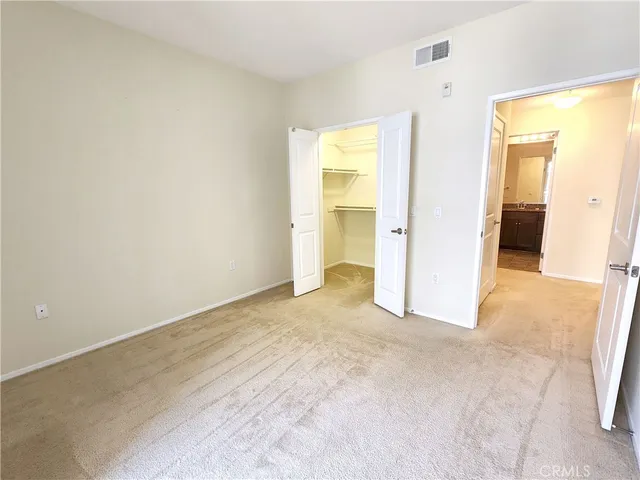 a view of a room with a bathroom