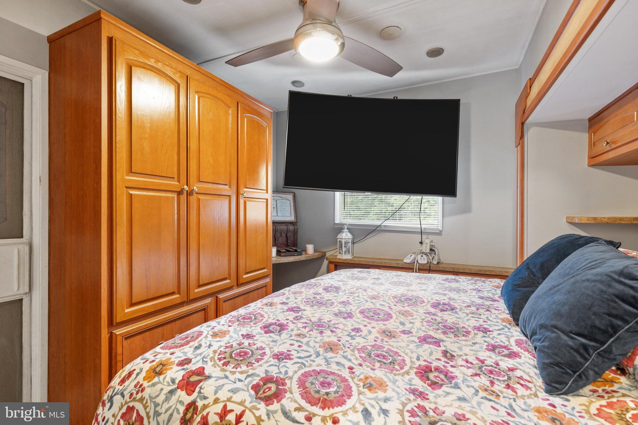 0 Flat Iron Road Montross, VA 22520 - Photo 62 of 116 Cozy bedroom with warm wood accents.