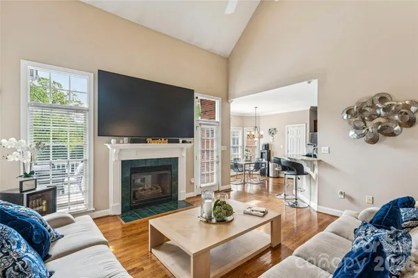 a living room with furniture rug and window