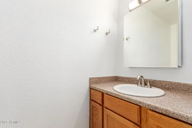 a view of a hallway with washer and dryer