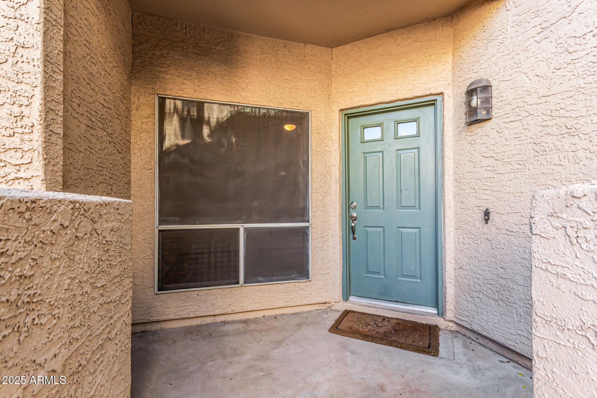 101 North 7th Street, Unit 135 Phoenix, AZ 85034 - Photo 2 of 33 a view of outdoor space with sliding door and wooden door