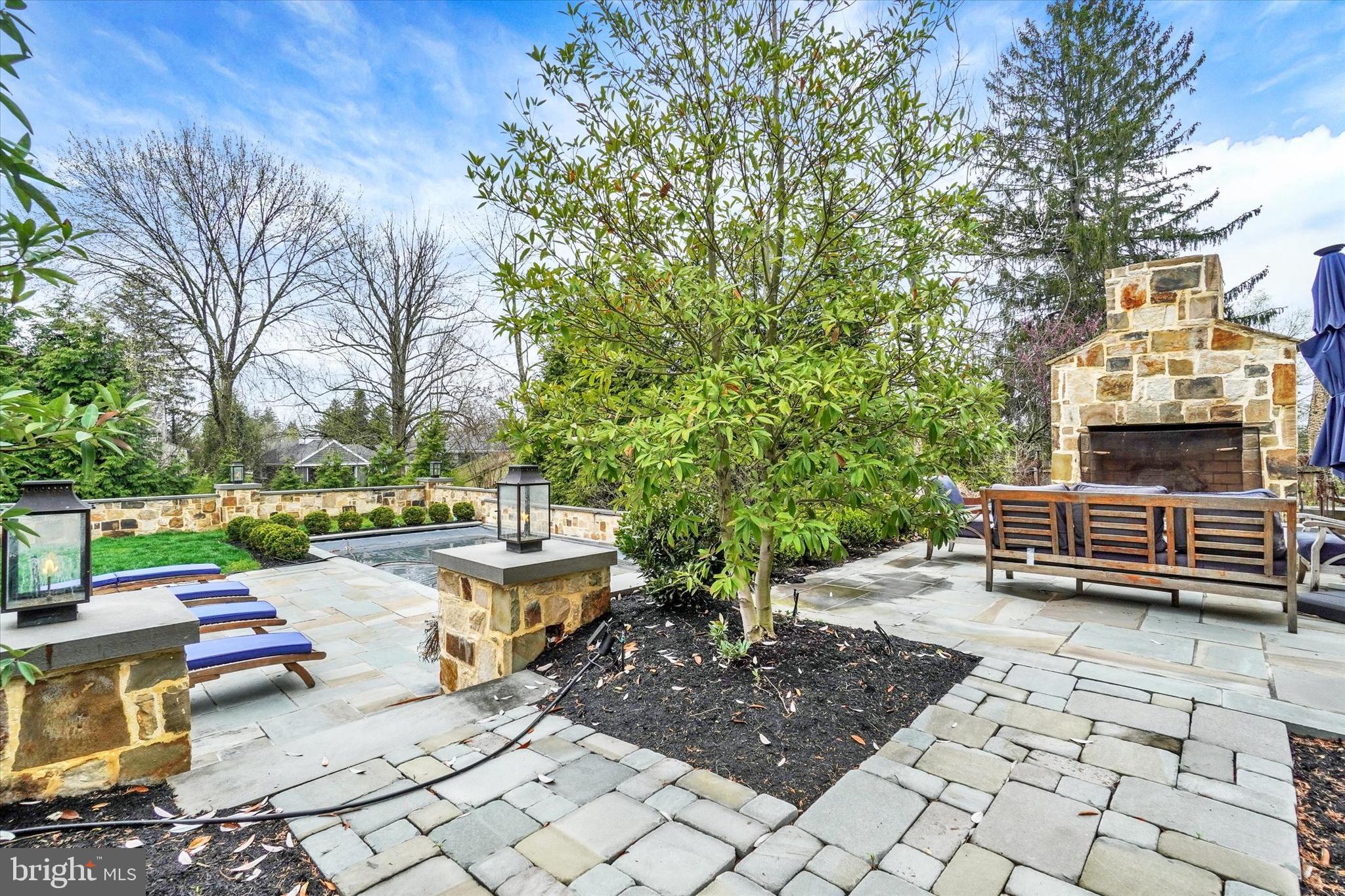 1029 Smallbrook Lane York, PA 17403 - Photo 4 of 64 Outdoor fireplace and stone patio