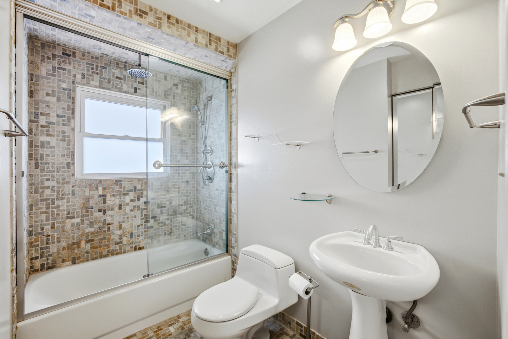 220 Dato Drive Streamwood, IL 60107 - Photo 23 of 36 a bathroom with a sink toilet and shower