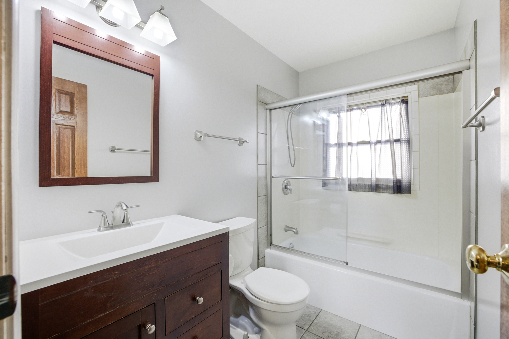 220 Dato Drive Streamwood, IL 60107 - Photo 24 of 36 a bathroom with a sink a toilet and shower