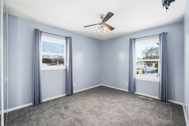 an empty room that has a window